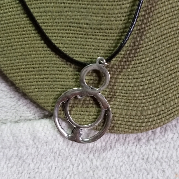 Silvertone swirl necklace on black cord - Picture 4 of 5